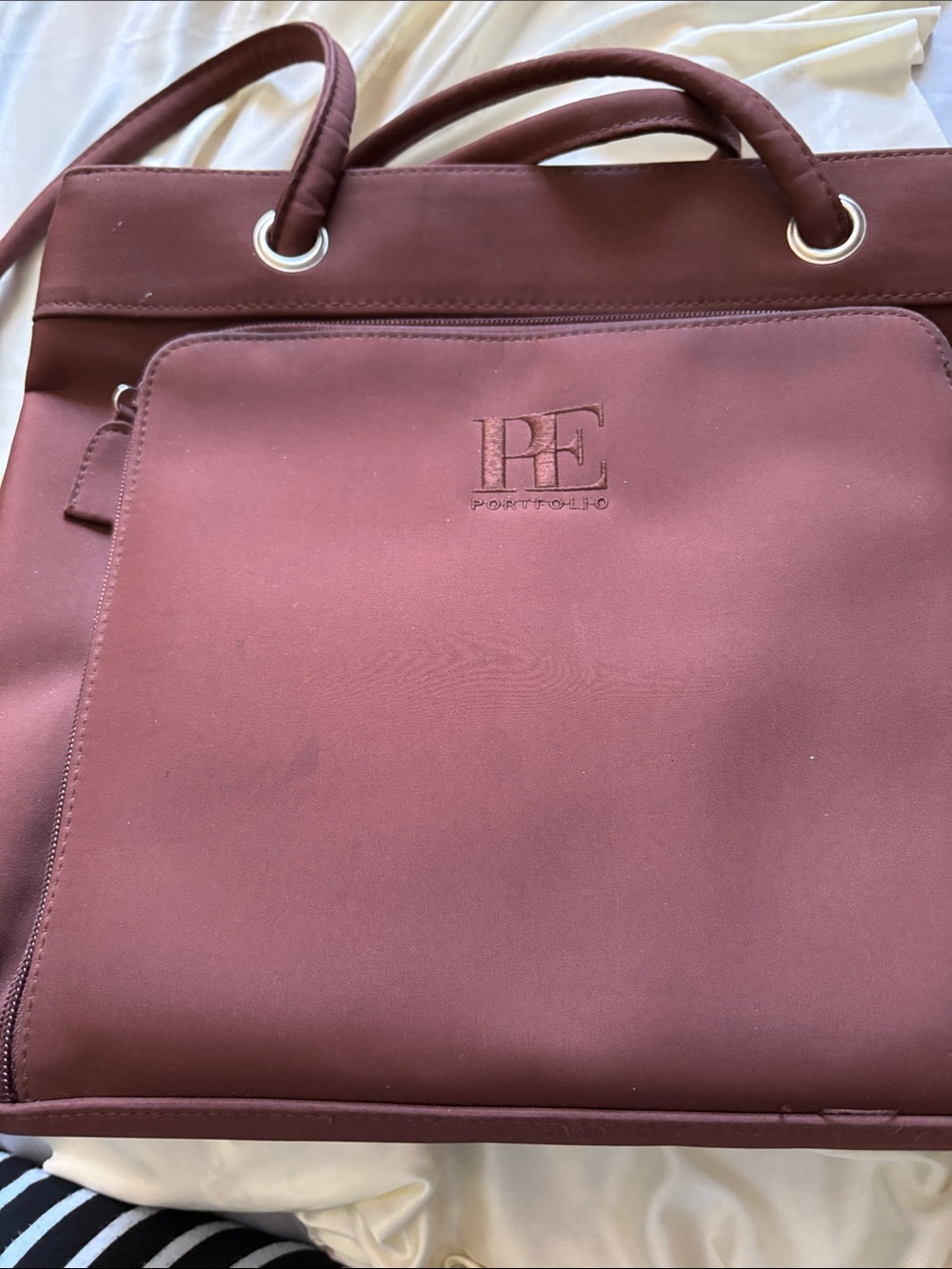 Perry Ellis Portfolio. Lots of pockets with working zippers